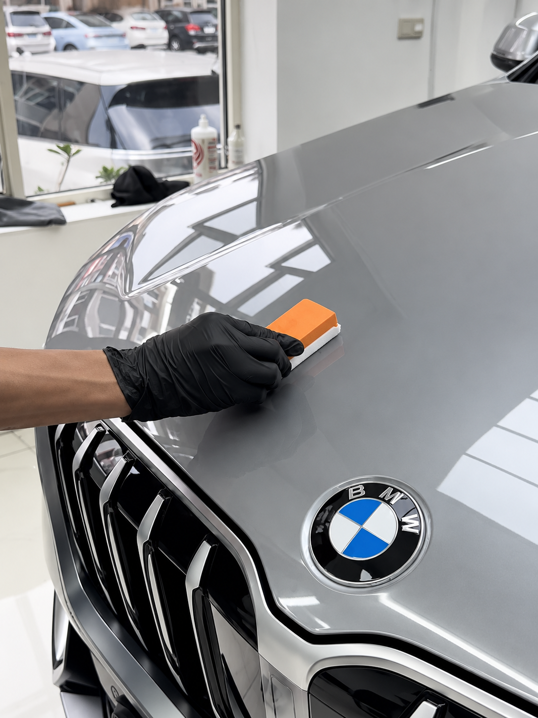Aplikasi coating pada permukaan cat mobil